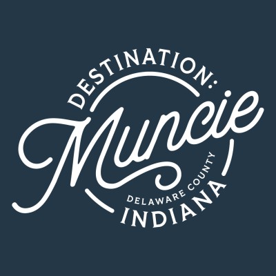 Destination Muncie Indiana logo on dark blue background.
