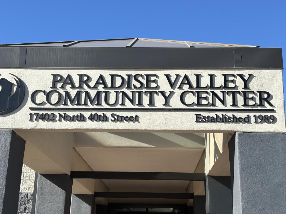 Paradise Valley Community Center entrance sign on a sunny day.