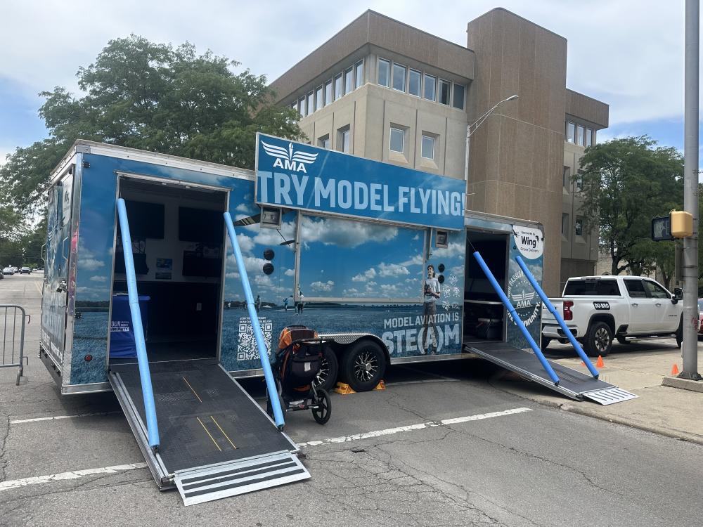 Mobile exhibit promoting model flying with wheelchair access ramps.