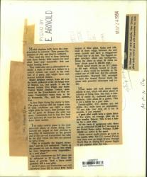 Magazine page with stapled print text and handwritten notes.