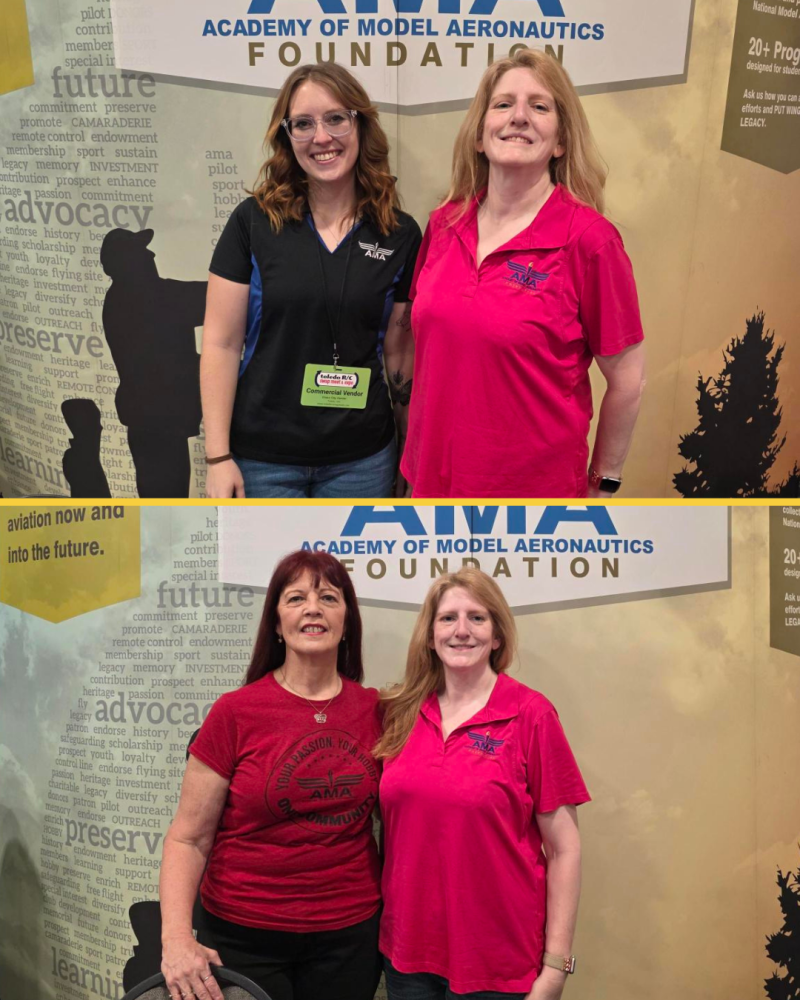 Two women smiling, standing in front of model aviation banners.